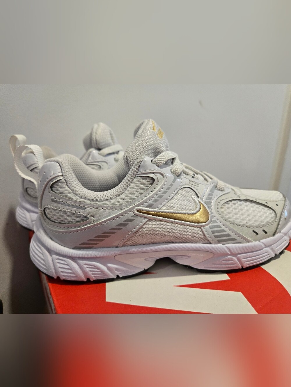 Nike Kids White and Gold Athletic Sneakers
